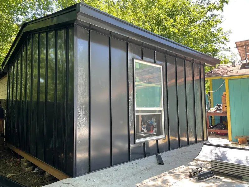 Black standing seam metal wall panels for Roof Inspection in Black Diamond